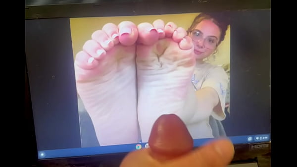 Shot a fat load on her bare feet